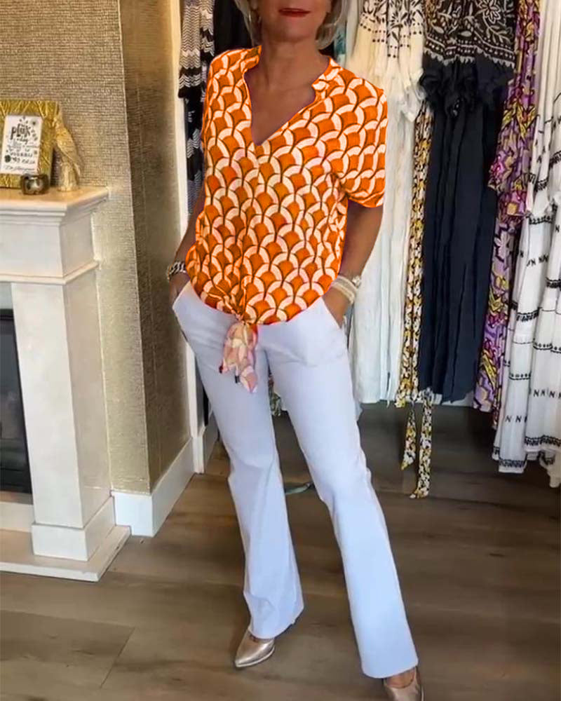 Irene - Short-sleeved V-neck printed casual top